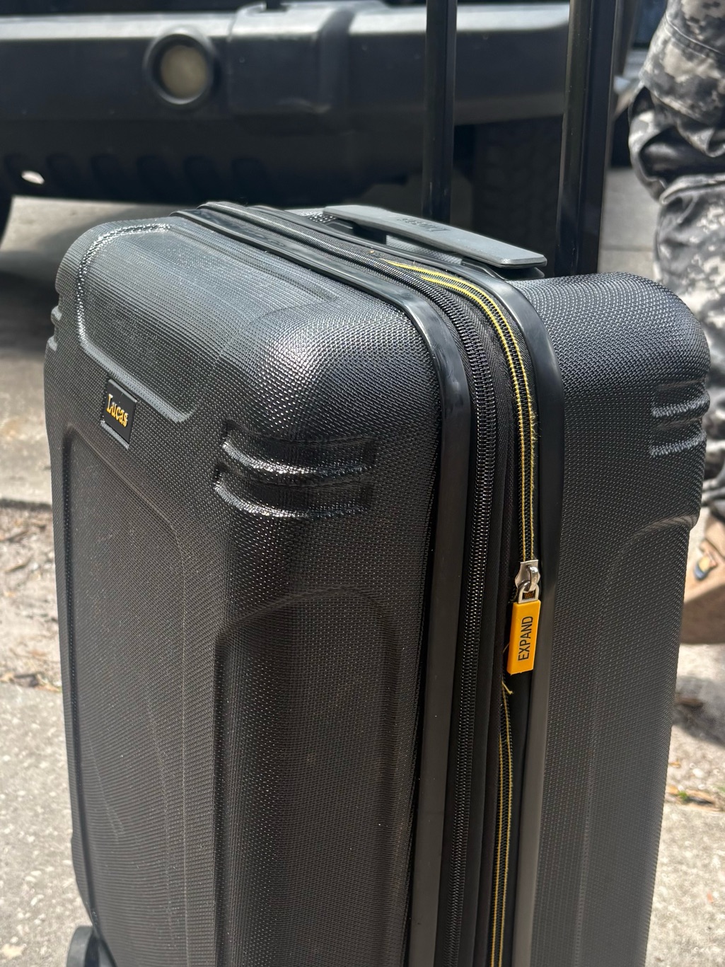 Lucas Expandable Black Hard-Shell 4 Wheel 22”Carry-On Luggage
